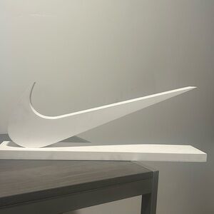 Wooden white Nike logo